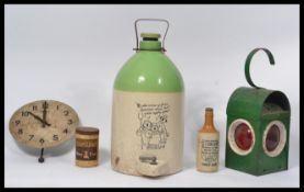A group of vintage items to include a Smiths wall clock , cider stoneware flagon , Geopi railway