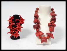 A group of large silver white metal and coral necklaces of varying form. Please see images.