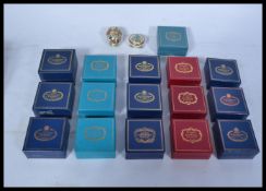 A large collection of 20th century Halycon Days and Bilston and Battersea enamel on copper pill