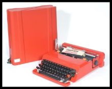 A vintage retro 20th century industrial Italian Valentine portable typewriter designed by Ettore