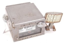 VINTAGE 1960'S BELL PUNCH CLOCKWORK TAXI METER & CAR BADGE