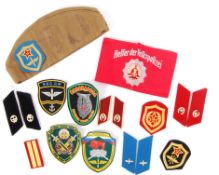ASSORTED 20TH CENTURY RUSSIAN & GERMAN MILITARY UNIFORM ITEMS