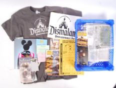 ASSORTED BANKSY DISMALAND BEMUSEMENT PARK RELATED ITEMS