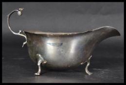 An Edwardian hallmarked silver sauce boat / creame