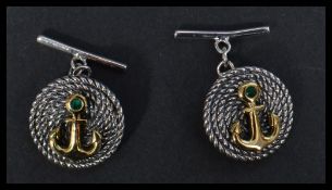 A pair of sterling silver cuff link cuffs of rope