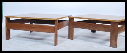 A pair of mid century Danish influenced teak wood