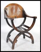 A mid 20th century Savonarola Italian throne chair