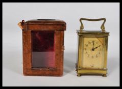 An early 20th century French gilt brass cased carr