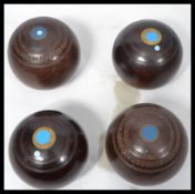 A set of four vintage 20th century lignum vitae la