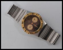 An 18ct gold and stainless steel cased Omega Const