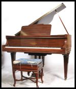 An early 20th century  mahogany cased baby grand p