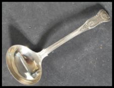 A 19th century Georgian silver hallmarked ladle in the Kings pattern having detached shell to the