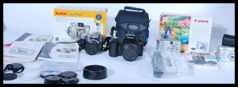 A collection of modern digital cameras to include