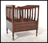 An early 20th century Regency revival mahogany Canterbury magazine rack in the Georgian taste having