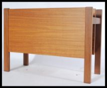 A 1970's Danish teak wood retro magazine rack - canterbury by Guy Rogers. The panelled body with