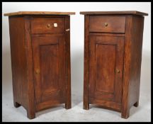 A pair of early 20th Century oak French bedside ca