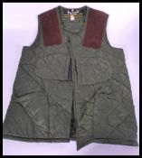 An original Barbour ghillie / gilet jacket coat in green patchwork  with makers label to the