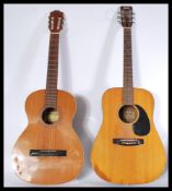 Two vintage retro 20th century acoustic guitars one by Santiago and one by Eros. Please see images.
