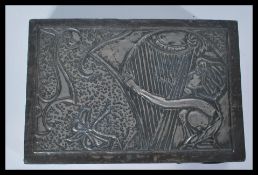 A good Art Nouveau stylised silver / white metal jewellery box, the hinged top adorned with a female