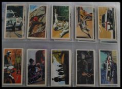 A group of four vintage 20th century cigarette albums Players Cycling , Army Life , Wills Military