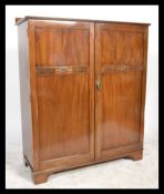 An Edwardian mahogany gentleman's bachelors wardro