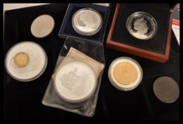 A collection of first day covers ( Coin and stamps )  and other commemorative collector coins.