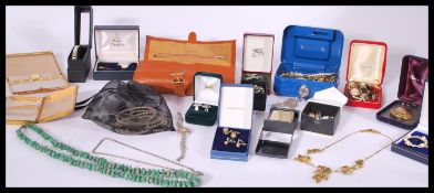 A good collection of vintage costume jewellery to include silver bar brooch, earrings, an Ingersol