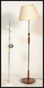 A vintage 20th century retro  teak wood and brass floor standard lamp with shade together with a