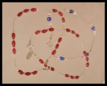 A group of three sterling silver bracelets set with semi precious stones, Weighs 12.6 grams.