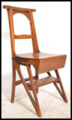 A Victorian 19th century oak metamorphic library chair - steps. The golden oak chair with fold
