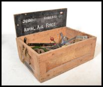A vintage ebonised military shipping crate, with notation to the front to include vintage electrical