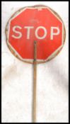 A vintage industrial 20th century stop and go lollipop sign with green and red panels. Measures:
