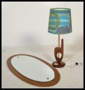 A vintage retro 20th century table lamp raised on circular base with central brass column along with