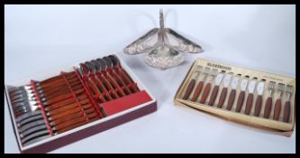 An early 20th century silver plated trefoil dish in the manner of WMF of oyster shell nautical