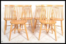 A set of six of vintage / retro Windsor spindle back elm and beech dining chairs in the manner of