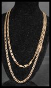 A hallmarked 9ct gold curb chain necklace having a lobster claw clasp. Measures 27 inches. Weight