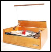 A vintage Goldring Leno GL75 record player, finishing in oreginal teak 'Dynatron'case / cabinet.
