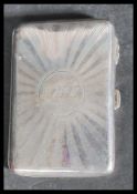 An early 20th century hallmarked silver aide de memoire case by Joseph Gloster with cigarette