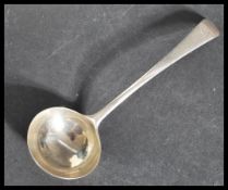An 18th century silver hallmarked sauce ladle in the reverse Hanoverian pattern. Believed by