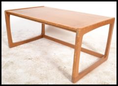 A vintage retro 20th Century Danish teak wood metamorphic coffee table / desk, flip over top