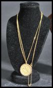 An early 20th century sovereign having an 18ct gold necklace chain and mount. Dated for 1906.