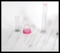 A collection of vintage retro 20th century scientific lab glass to include various test tubes ,