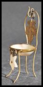 An unusual 19th century Victorian eye bath in the form of a miniature dining chair. The eye bath