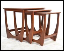 A G-Plan retro teak wood 1970's graduating nest of tables in the Quadrille pattern. The tables