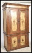 A 20th century painted house keepers cupboard wardrobe of Austrian / Bavarian origin. Twin door