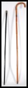 Two Victorian silver collared walking stick canes having tapering shafts with silver hallmarked