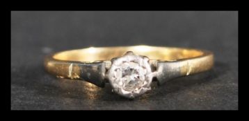 An 18ct gold and diamond solitaire ring set with a single round cut diamond.Diamond approx 20pts.