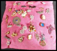 A collection of vintage and contemporary costume jewellery ladies broaches to include marcasite,