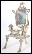 An apprentice piece silver plated dressing table in the Louis XVI style raised on cabriole legs with