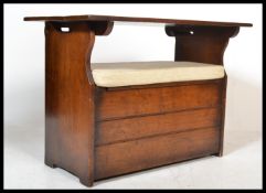 A good 20th century oak monks bench settle with ca